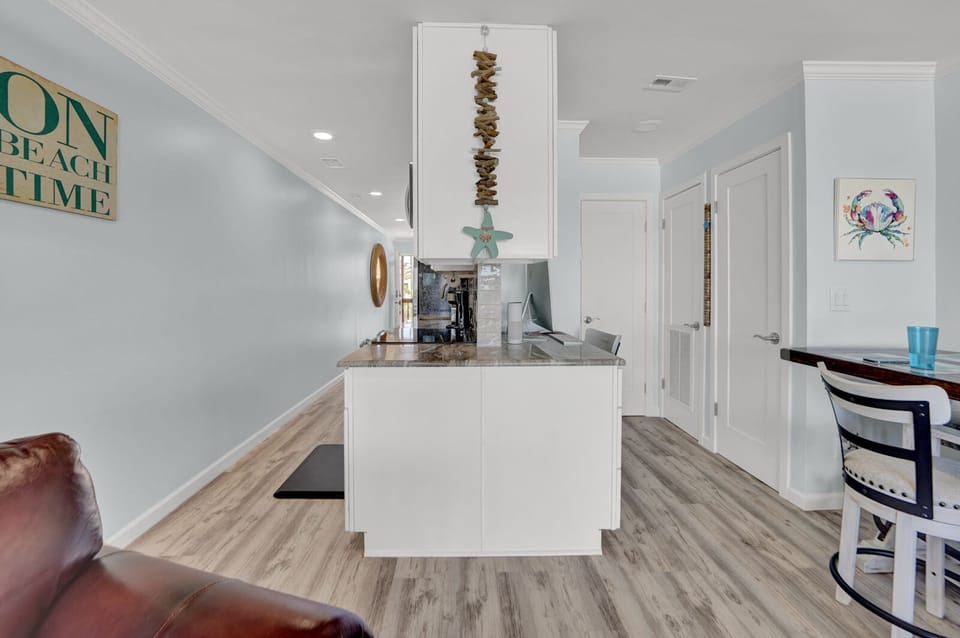 Kitchen to left and Bathroom door to right. 