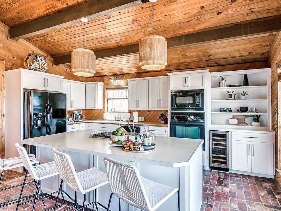 Fully stocked kitchen with large kitchen island and open floor conecpt