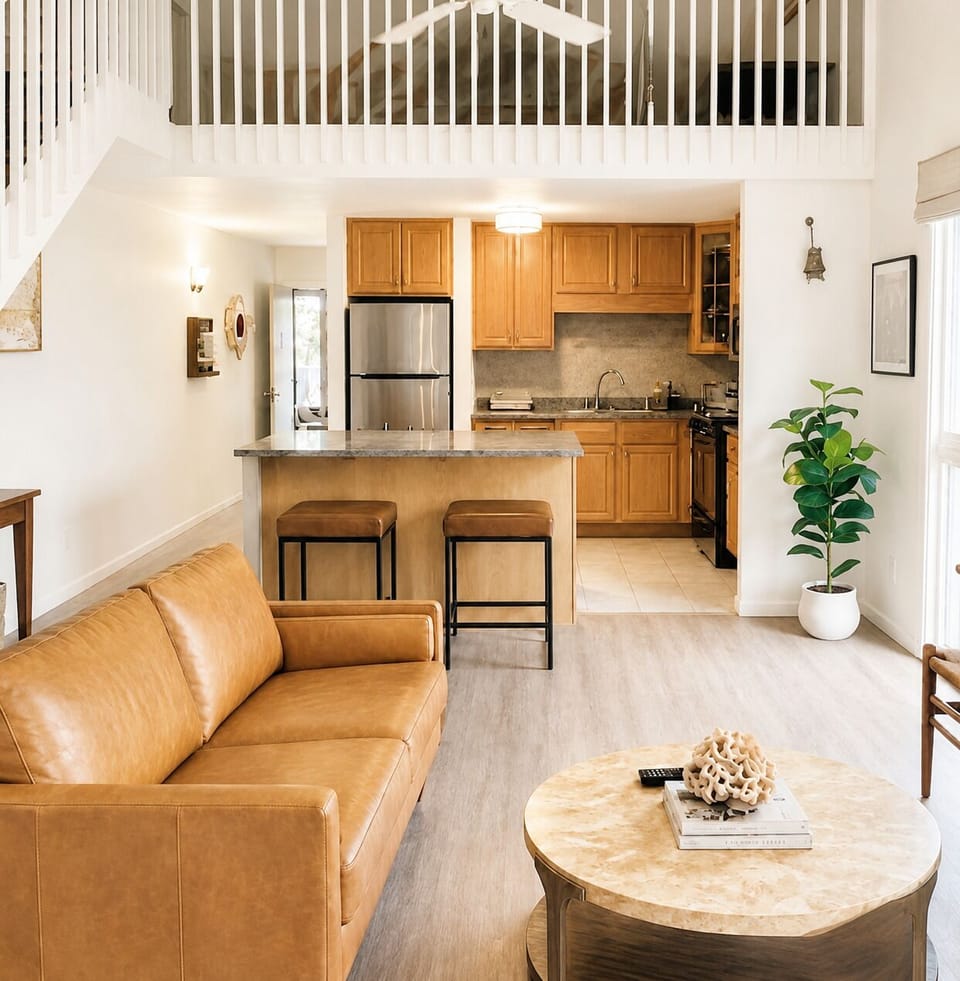 living room with updated furniture, ac and ceiling fan 