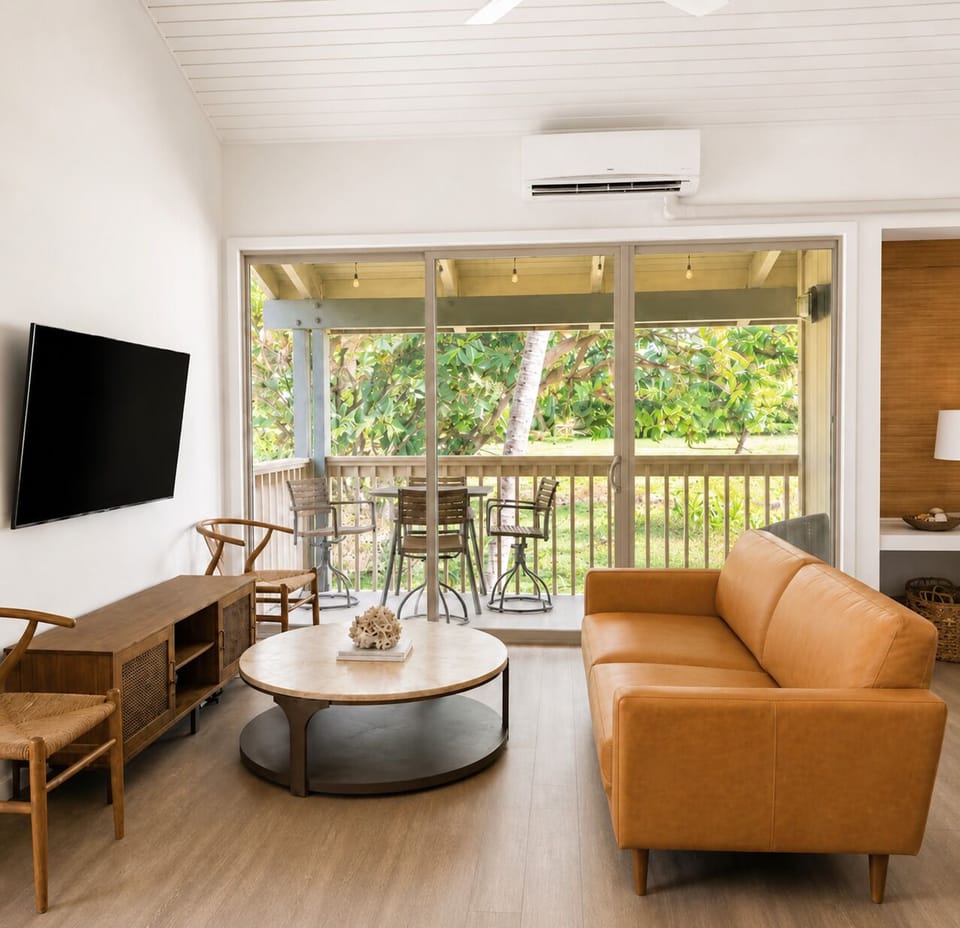 View of the lanai and golf course from the kitchen 