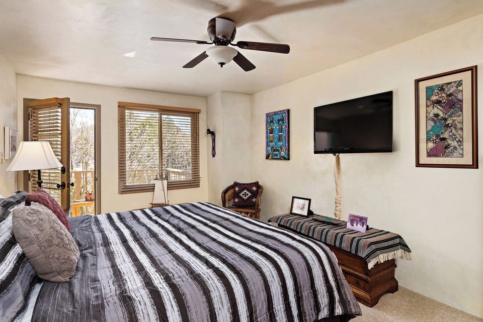 Primary Bedroom with 1 King Bed & Balcony Access