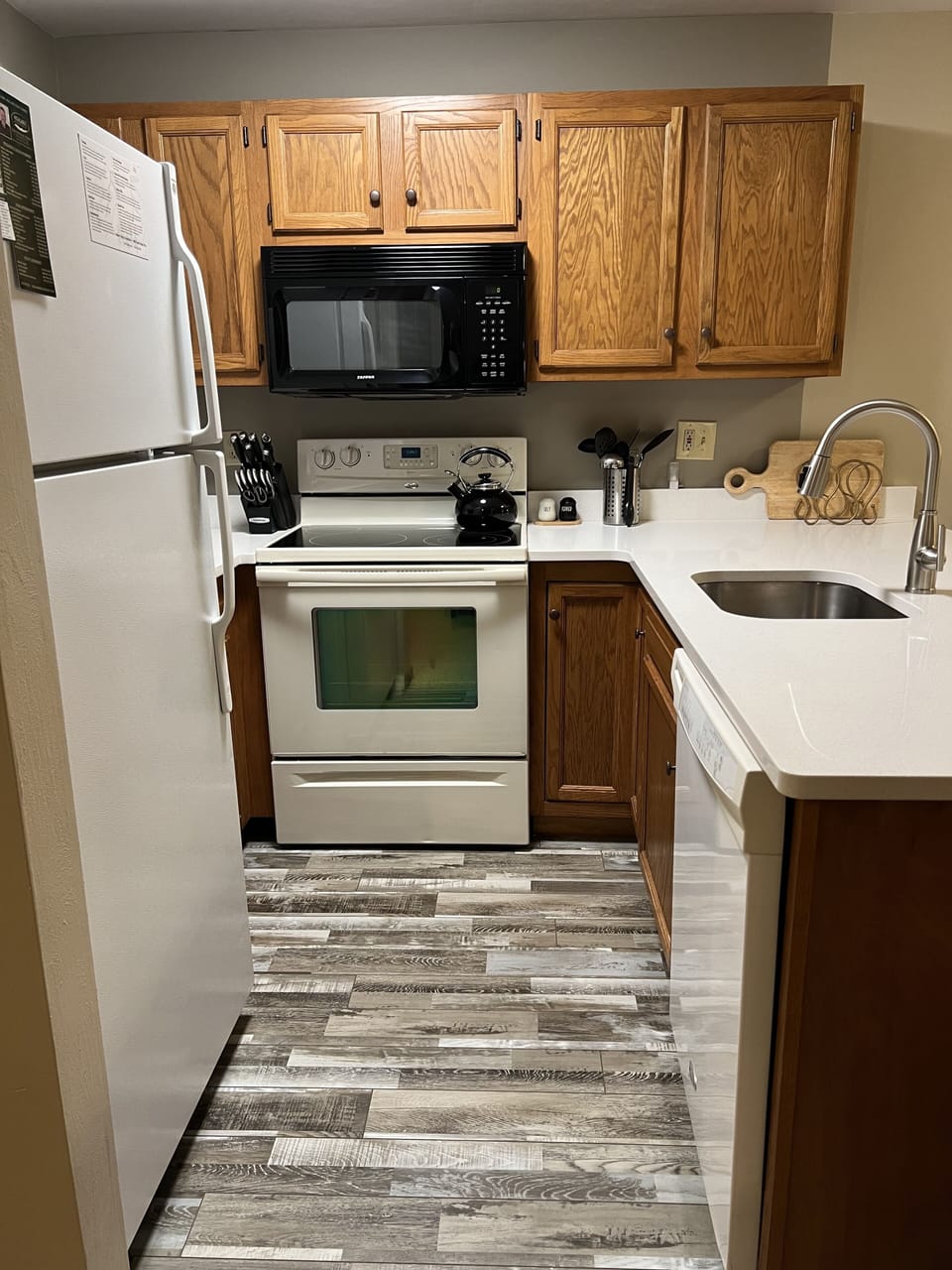 Updated stove, dishwasher, countertop, and floor!