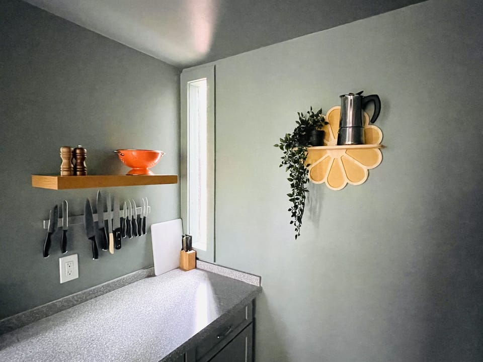 Kitchen has plenty of knives and everything else you need to prepare all your meals.
