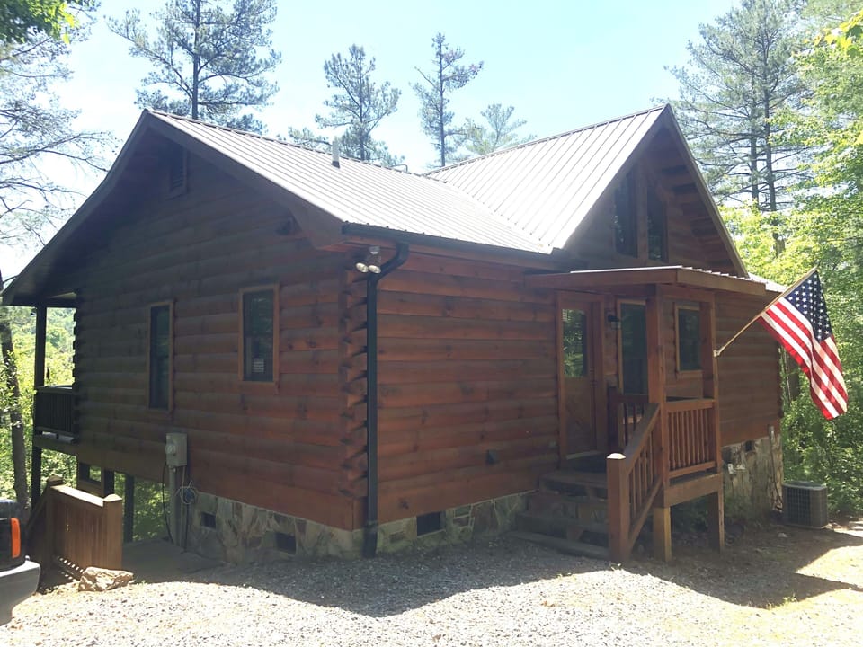 outside of the cabin in the summer 