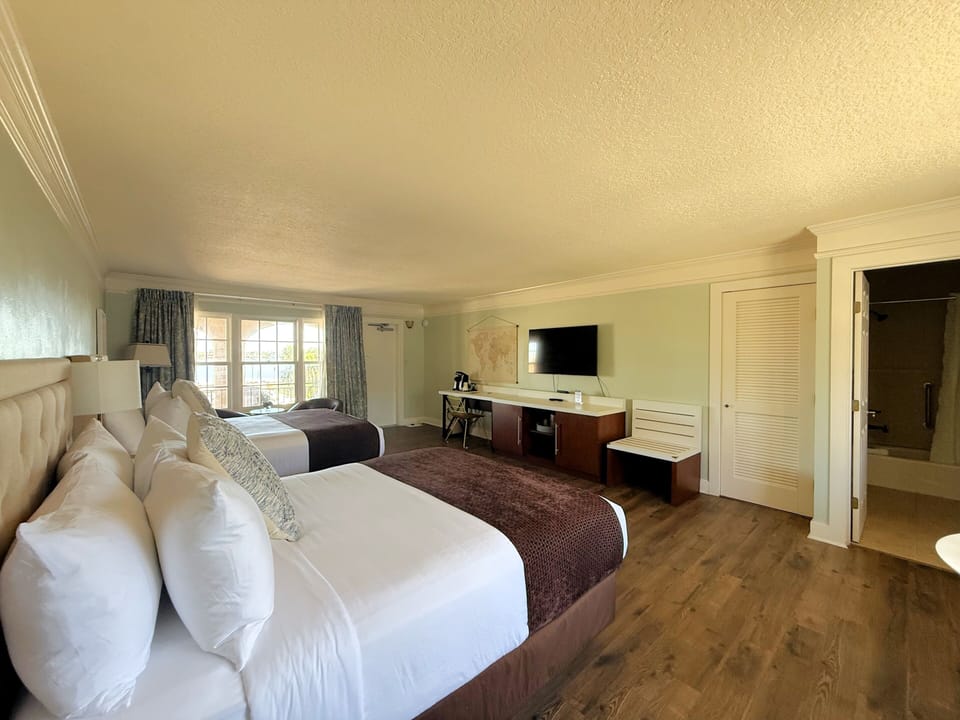 Deluxe Room, 2 Queen Beds, Courtyard View | Premium bedding, desk, iron/ironing board, free WiFi