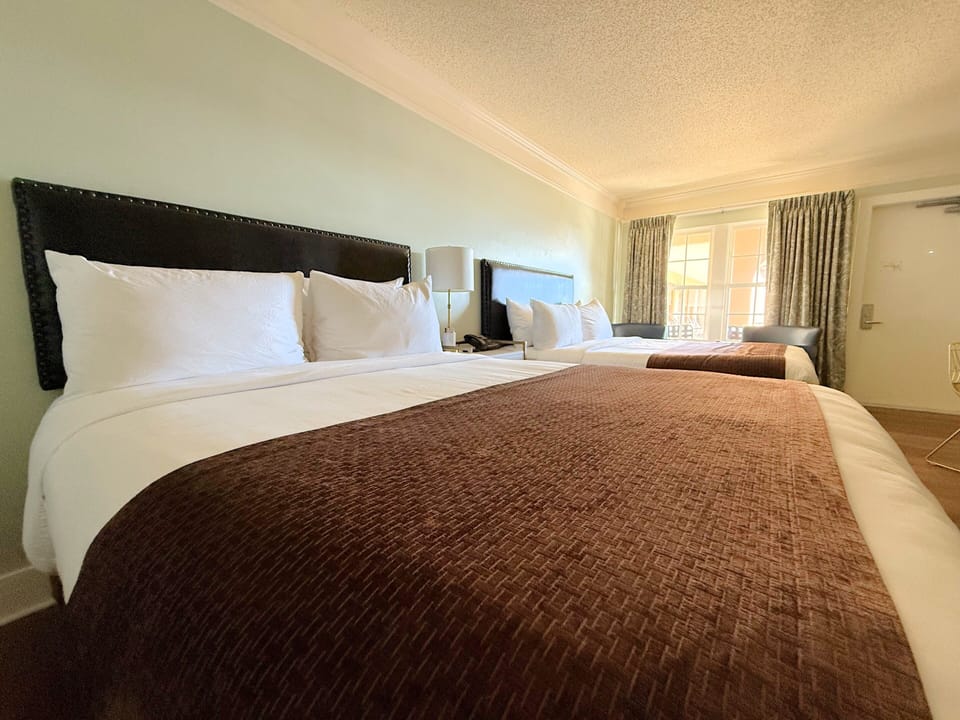 Standard Room, 2 Queen Beds, Non Smoking, Ground Floor | Premium bedding, desk, iron/ironing board, free WiFi