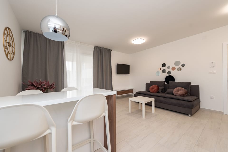 Superior Apartment, 2 Bedrooms, Balcony | Living area | 48-cm flat-screen TV with satellite channels, TV