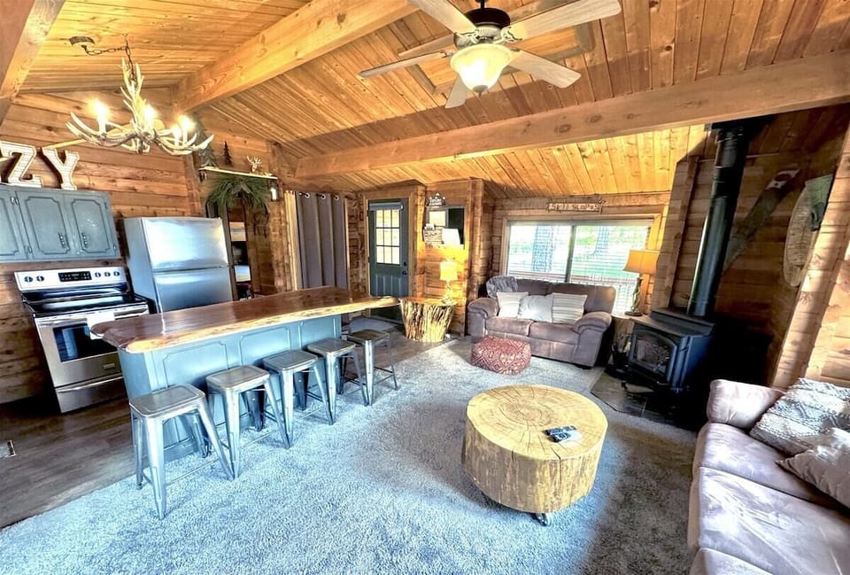 Living area with wood burning stove, Sat/Smart TV,
