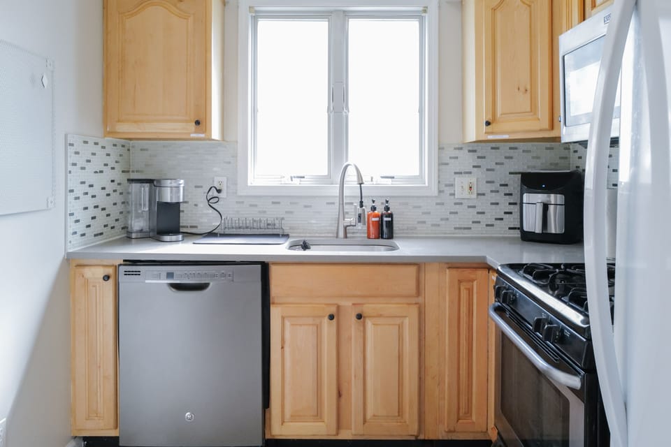 Full kitchen with pan and pot.  Make a meal is a piece of cake