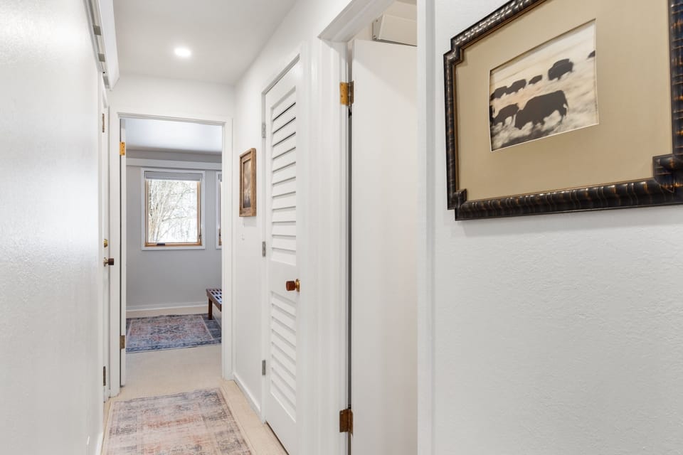 Hallway leading to Primary Bedroom and Guest Bedroom