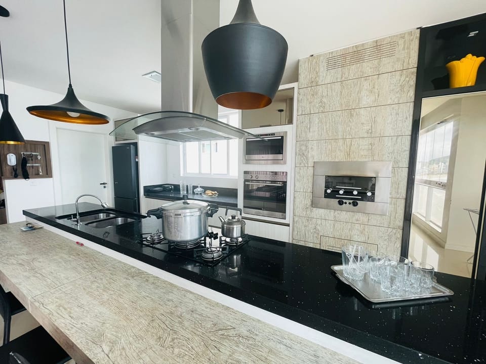 Luxury Apartment | Private kitchen | Full-size fridge, microwave, oven, toaster