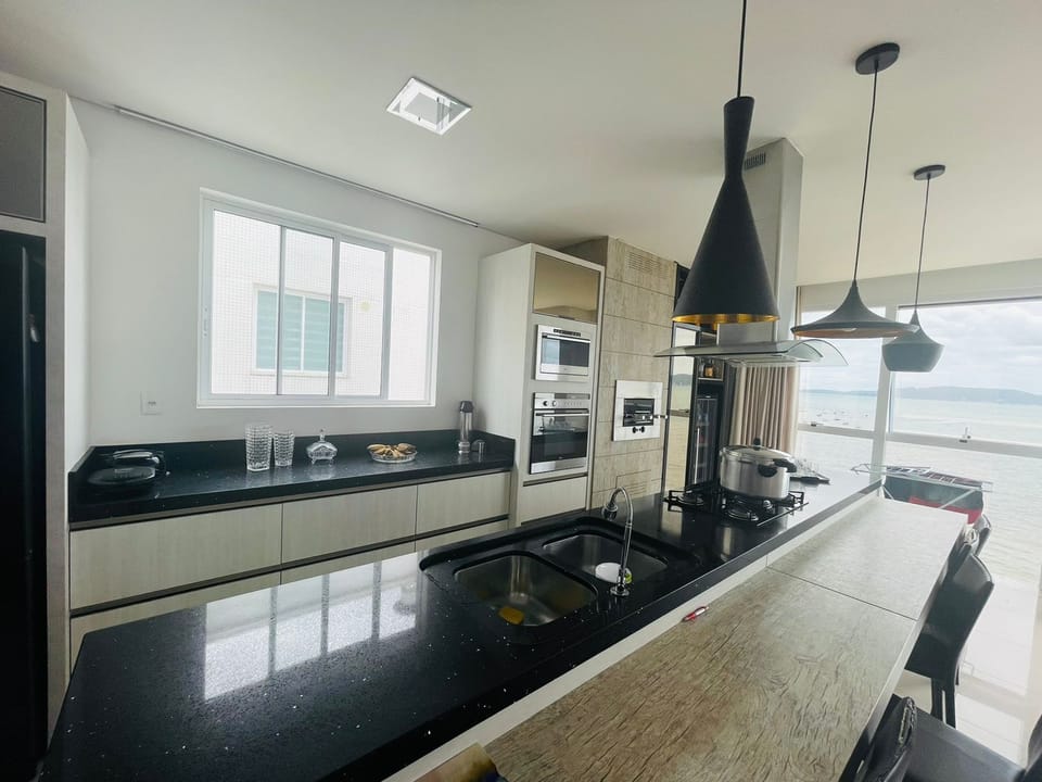Luxury Apartment | Private kitchen | Full-size fridge, microwave, oven, toaster