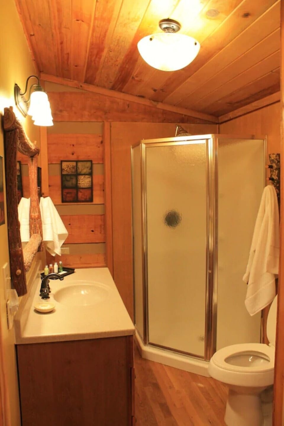 Master bathroom where the stacked washer and dryer are located. 