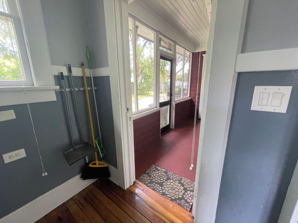 View out the back door onto back porch (shared porch)