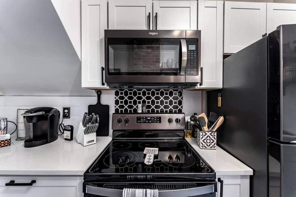 Brand new appliances and beautiful tile