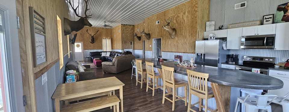 8 bar stools and small dining table that could hold up to 6 pl 