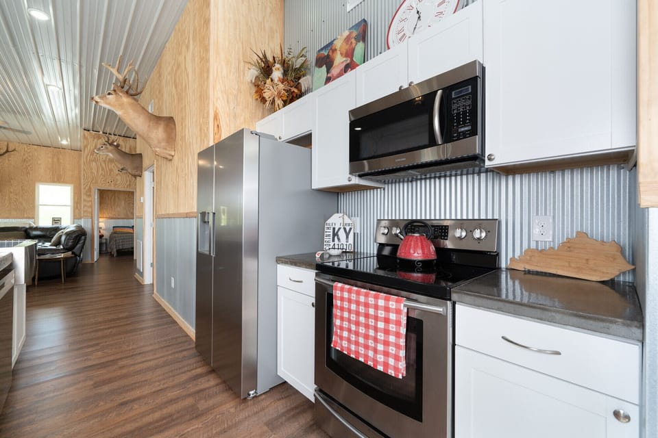 Full size fridge, stove, dishwasher and microwave. 