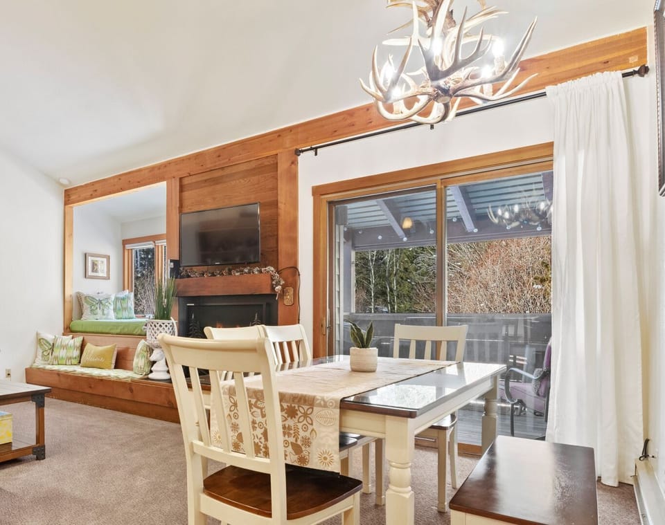 Dining Area and Living Room with Deck Access