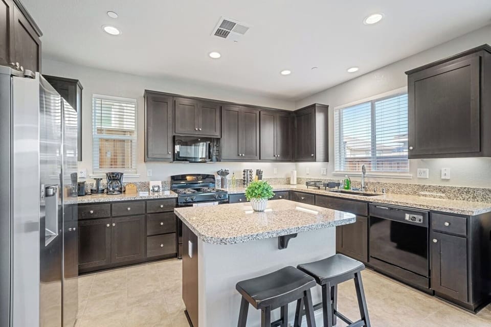 A kitchen island for extra cooking or an eating surface.