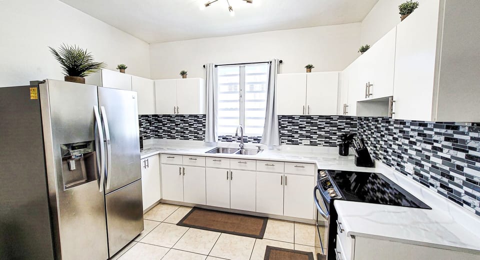 Fully functional kitchen with essentials- coffee maker. blenders, pots and pans
