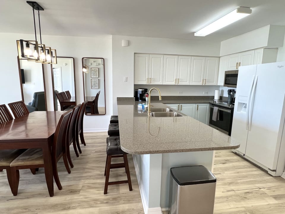 Full kitchen and dining area.