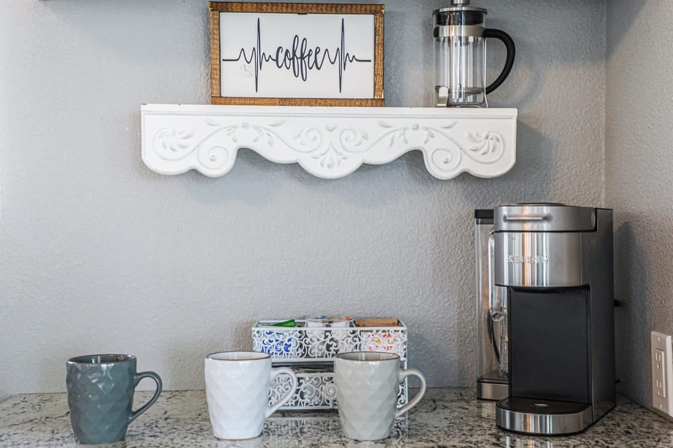 Our coffee bar is stocked with single serve coffee packets, k-pods, tea and accompanying condiments.