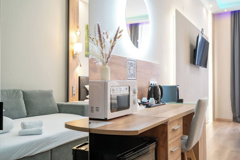 Premium bedding, down comforters, free minibar items, in-room safe