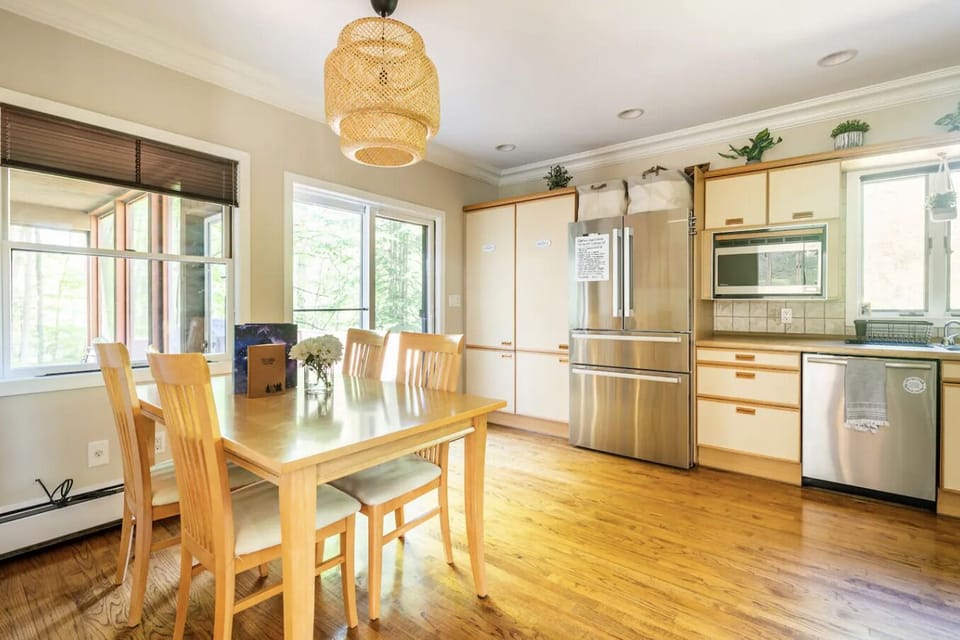 Breakfast nook that looks out onto the deck and garden
