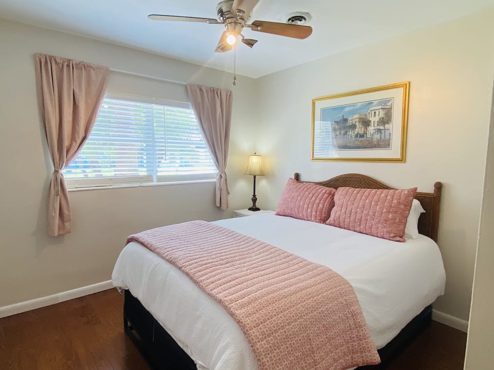 Bedroom #1 with queen size bed and luxury linens
