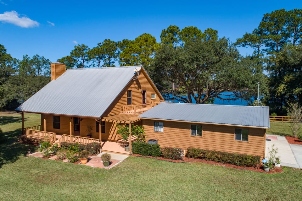 Cabin is building on left, garage is on right and currently not accessible 