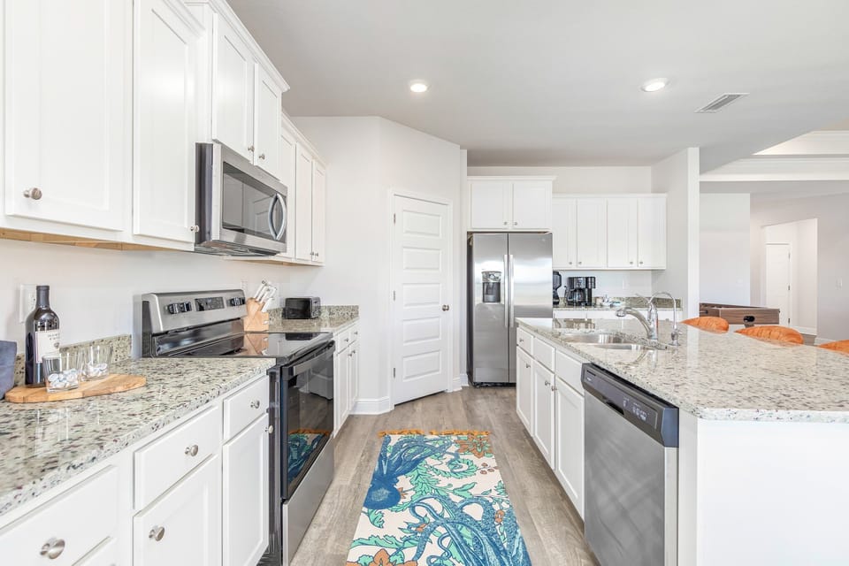 Kitchen: Fully stocked| coffee pot (takes grounds, k-cups or french press), ninja blender and stainless steel appliances.