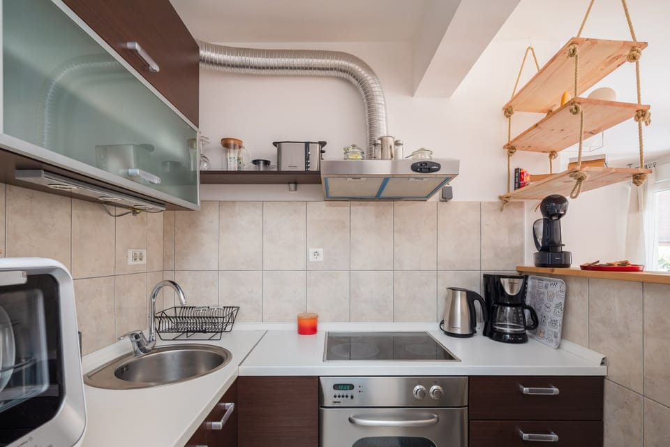 Apartment | Private kitchen | Fridge, oven, stovetop, dishwasher