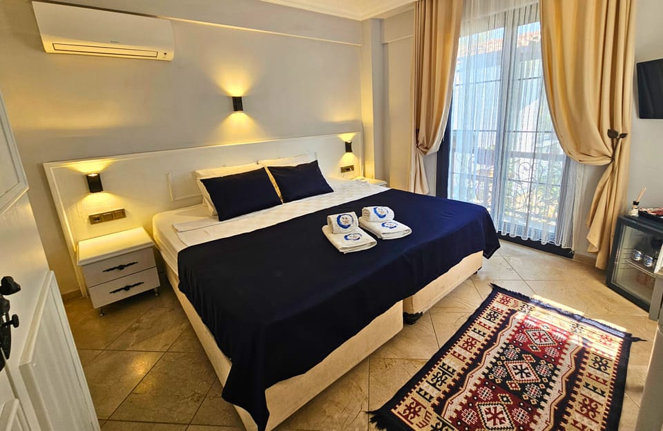 Standard Room, Garden Area | Minibar, in-room safe, desk, laptop workspace