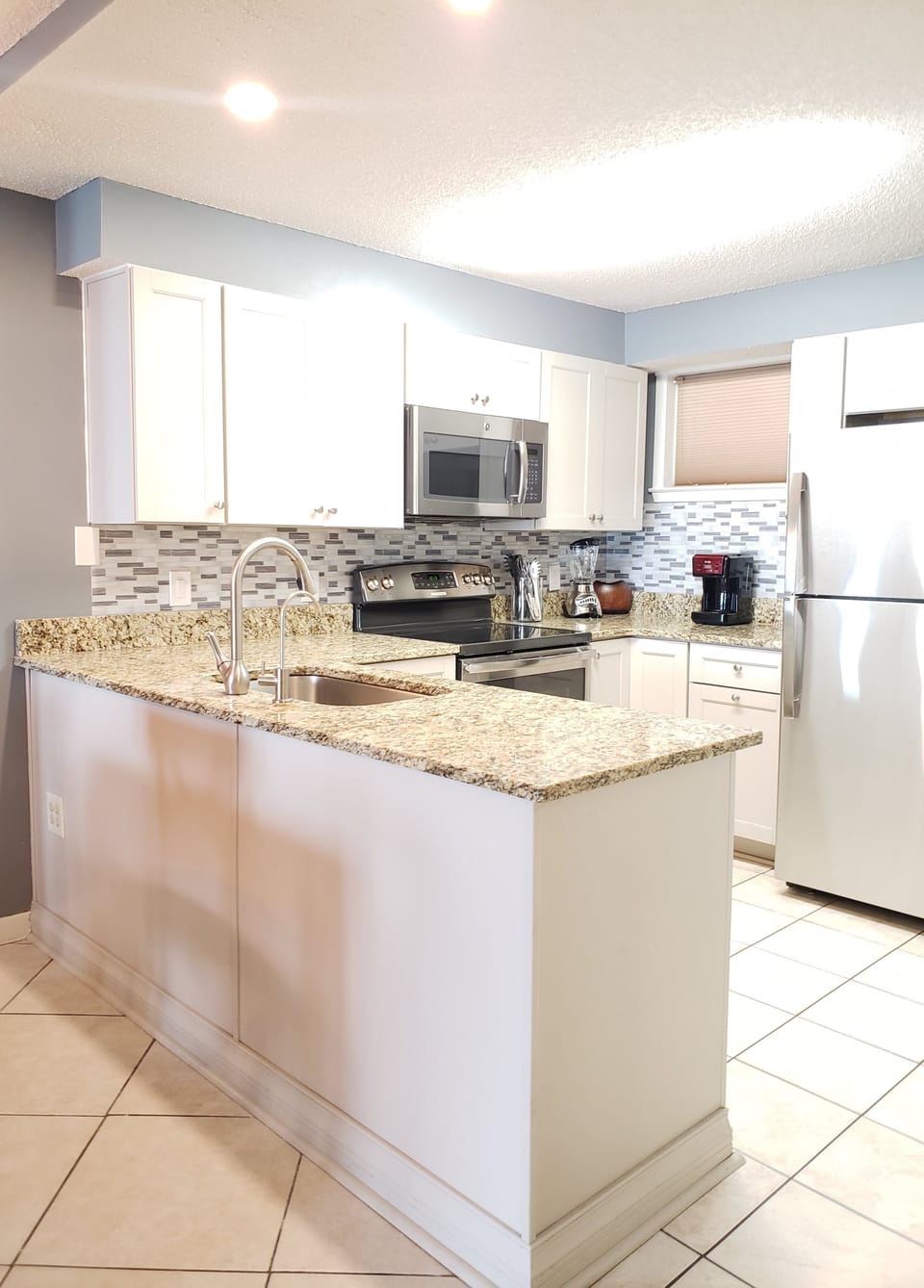FULLY STOCKED KITCHEN HAS EVERYTHING YOU NEED TO PREPARE MEALS