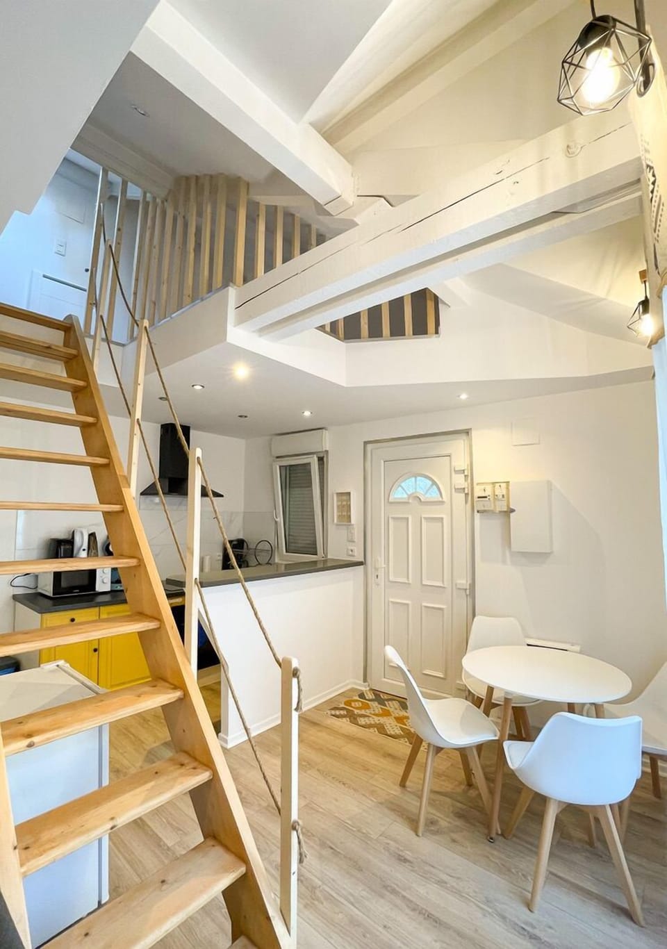 The living room and stairs to the mezzanine