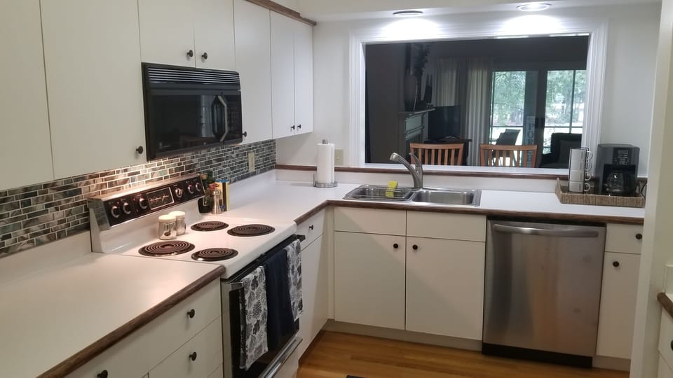 Kitchen with pass through window