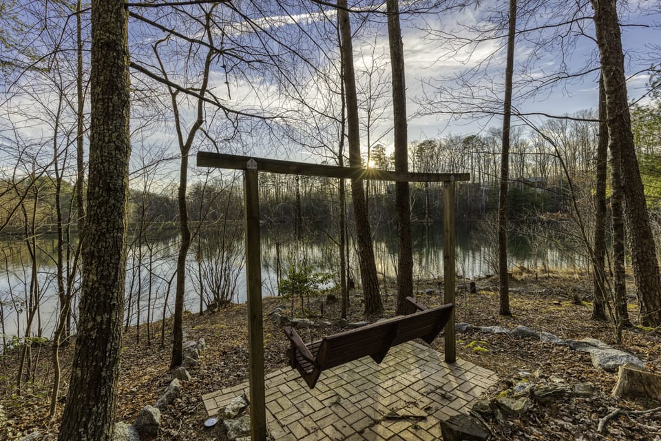 Lakefront swing for couples to cuddle, friends to chat or just to read a book.
