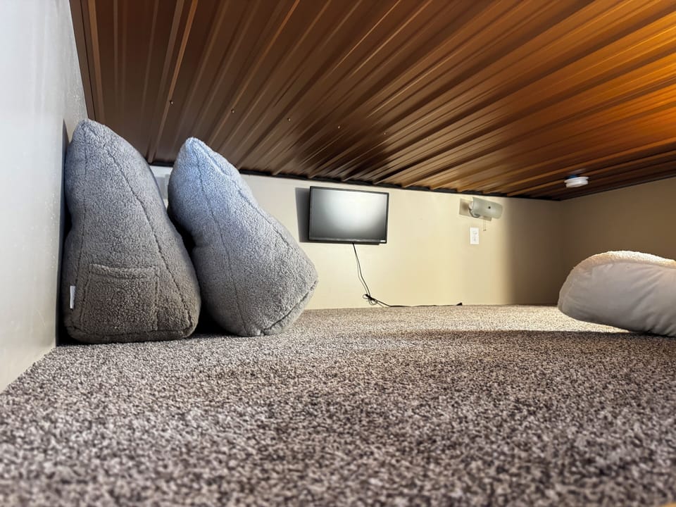 Small Loft space for reading or cozying up for a movie.