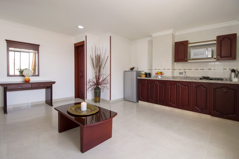 Standard Quadruple Room | Private kitchen | Mini-fridge