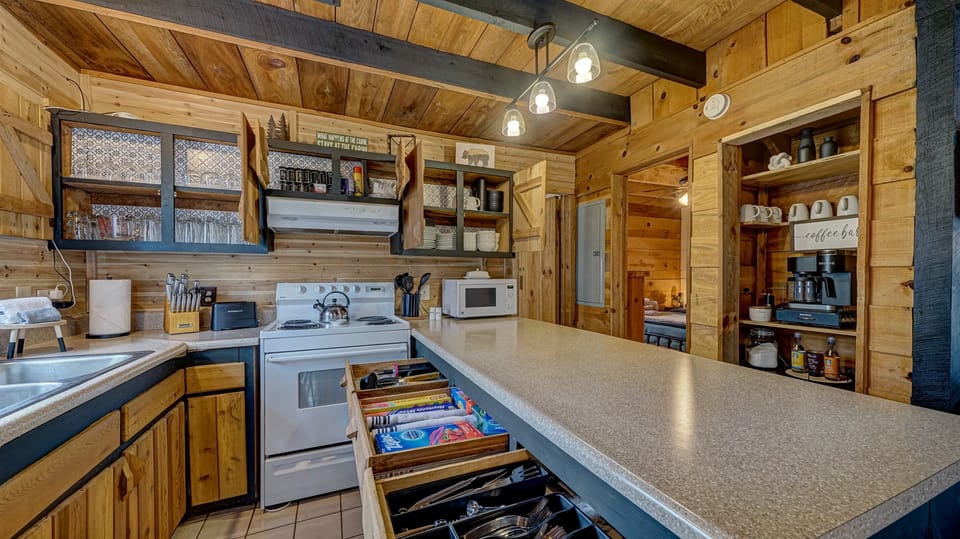 Fully stocked kitchen for all your needs. Wine glasses, utensils, pots and pans, etc. We've got it for you.