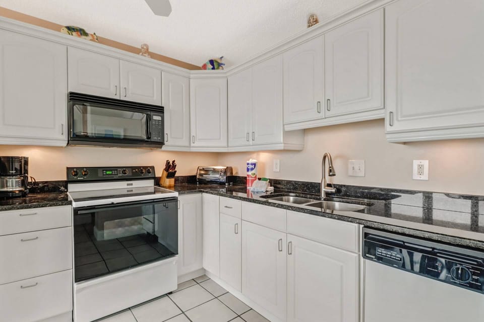 Cookware, dinnerware, electrical appliances and kitchen tools are provided for your convenience.
