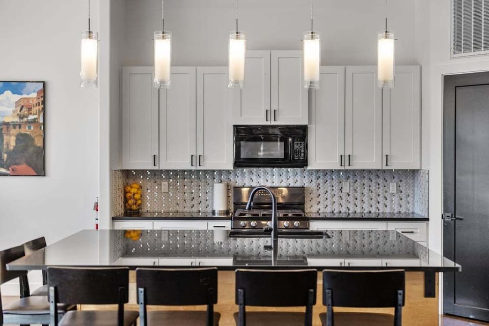 The kitchen's inspiring space is ideal for whipping up delicious meals and entertaining guests.