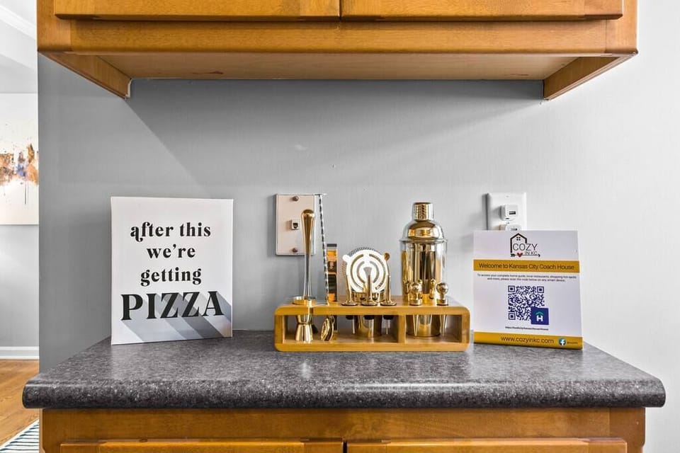 Thoughtfully stocked shelves with glassware and essentials for easy meals and relaxing nights in