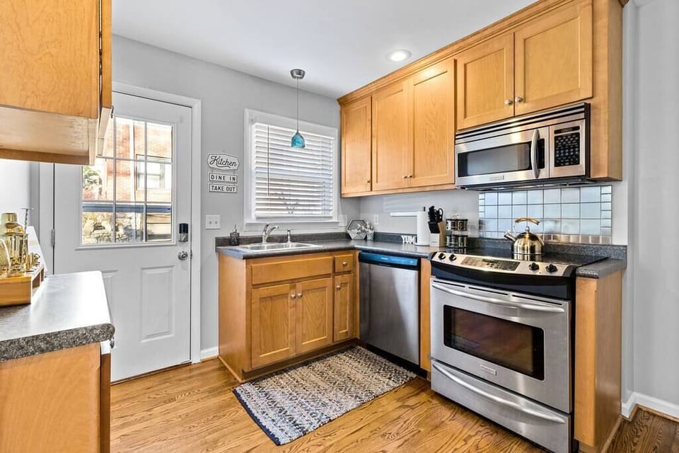 Fully equipped kitchen with stainless steel appliances, great counter space, and everything you need for cooking at home