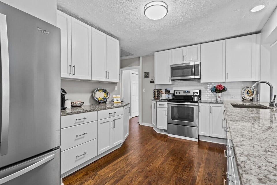 Generous countertop space and full-size refrigerator make this kitchen perfect for families and longer trips.