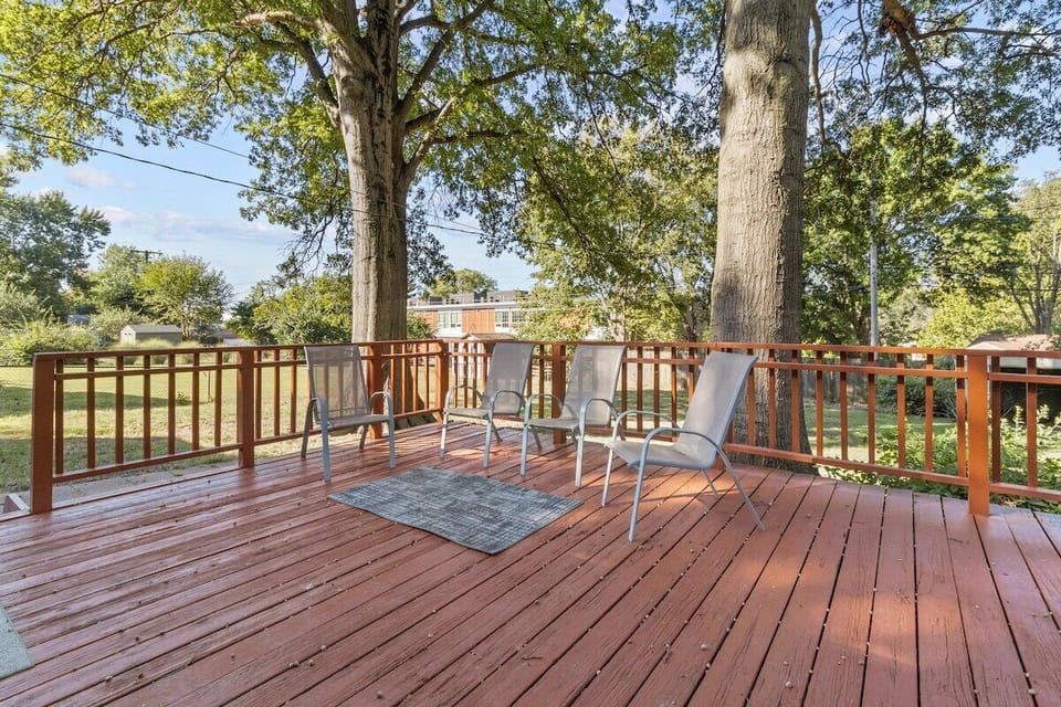Relax on the roomy back deck, complete with outdoor seating and serene views—ideal for morning coffee, remote work breaks, or evening hangouts.