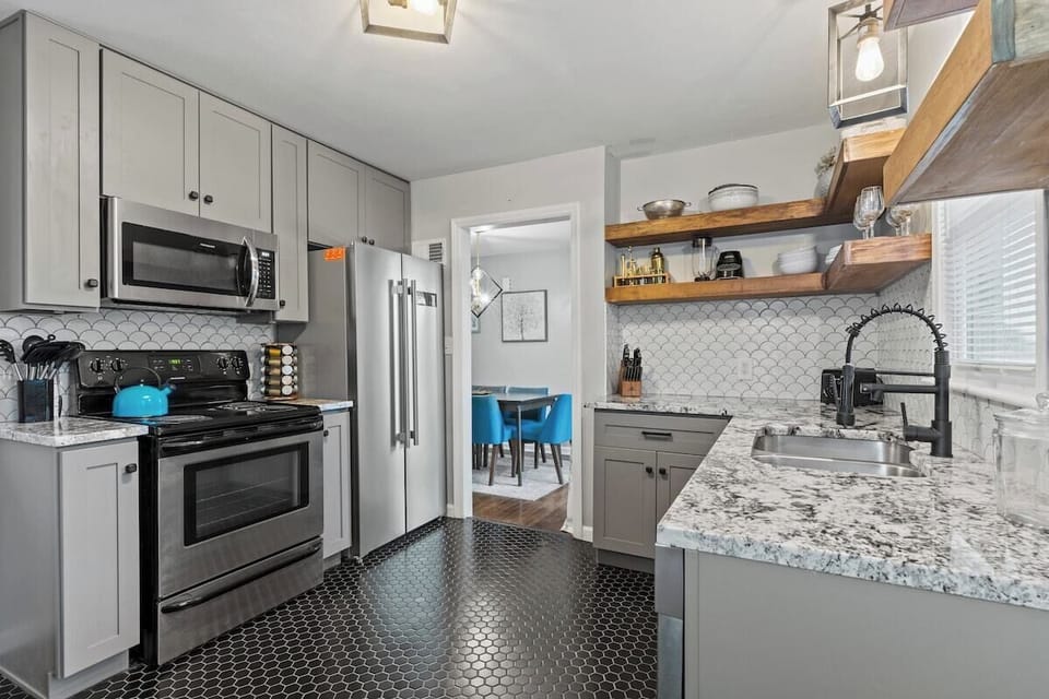 Convenient basement laundry area stocked with detergent and essentials—perfect for long-term stays.