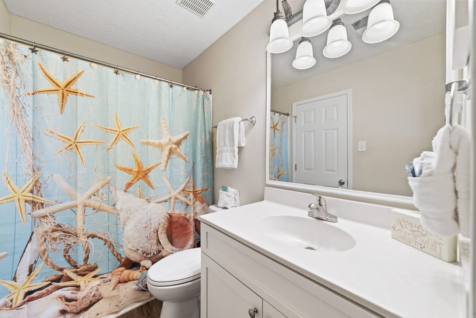 Twin Bathroom - Freshly updated bathroom featuring a shower/tub combination, ample vanity space, and modern fixtures.