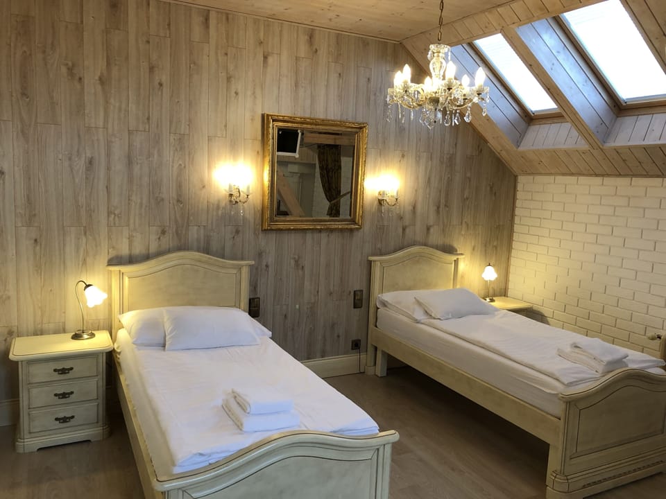 Superior Twin Room | Minibar, in-room safe, individually decorated, desk