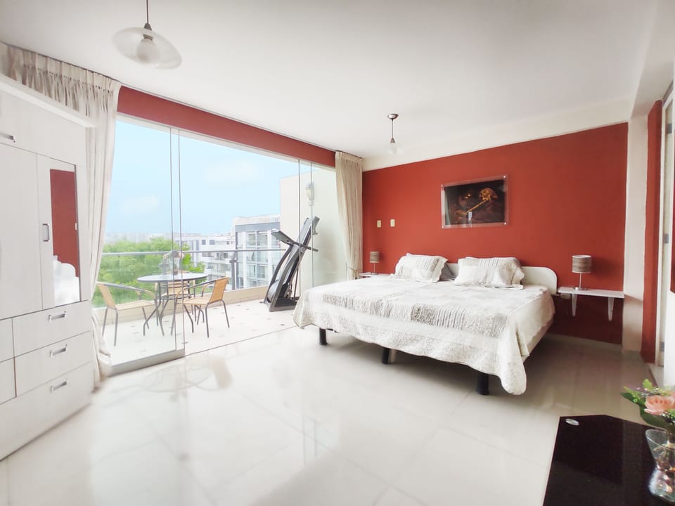 This will be you spacious room with a king-size bed and balcony.
